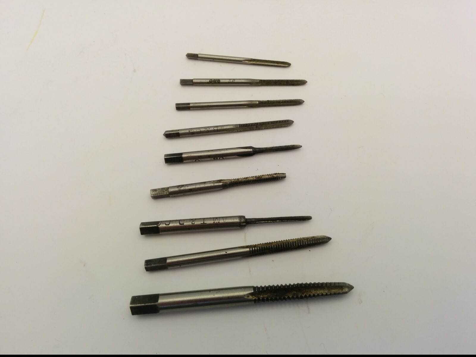ASSORTMENT TAPS: AMT & D, B & CO., W.R. CO. AND MORE (LOT OF 9)